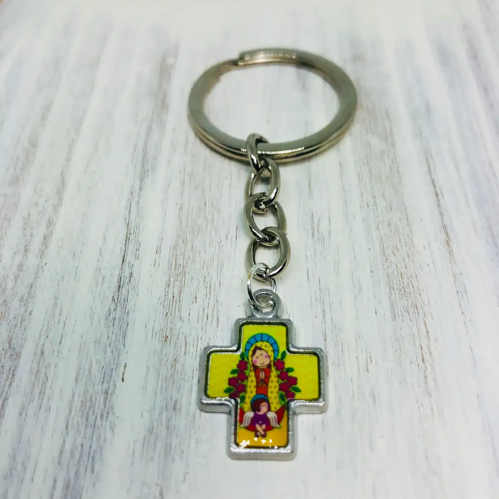 Llavero Virgen Please en Cruz